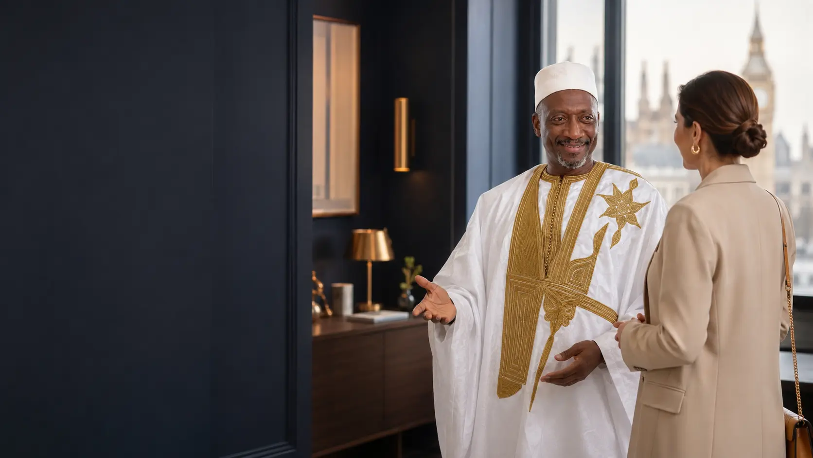 Badara, psychic medium in the UK, welcoming a client in his London consultation room